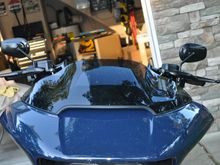 Should still get really good wind protection. At 5'9" the bars are shoulder height. 