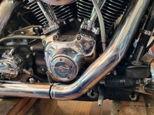 Heat wrap all covered up. On my bike there was a gap between the heat shields directly under the cam cover. Kuryakyn makes a nifty little gap cover, if nothing else gives it a more "Finished look"