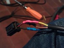 The plugs I've cut off from  the tail light and the turn signals are placed on new electrical wires and connected to the relay under the seat.