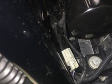 I disconnected the front and rear o2 sensor connectors instead of removing them as it's easier. The front runs along the front under the voltage regulator. The rear goes under the seat. Have to be gentle with it but I slid the connector through the access hole towards the top on the left side of the compartment.