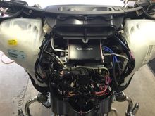 Pioneer speakers mounted inside the pods with polyfill.