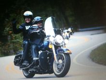 Show us your Dragon photos. My wife and I rode the Dragon in October along with 8 of our friends, you can see some of them behind us. GREAT RIDE.