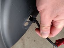 Fits through the forward hole.