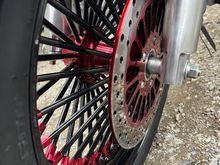 DNA Mammoth 52 fat spokes (18” Front/16” Rear). With matching rotors and pulley.
Powder coat: Black/Candy Red