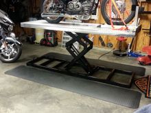 My 1973 SS350 sitting on my handmade motorcycle lift. My 2015 CVO sitting in the background.