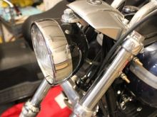 This is the headlight relocating mount.