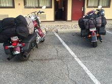 We pack two duffle bags of gear, one of clothes and a cooler on our bikes. Yes they ride fine loaded up. Key is giant duffles so the weight is low.