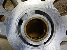 Scoring on the plate.  The bushing is good