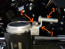 1.  Purchased a 2" angle bracket from Lowes, increased hole sizes to suit and trimed with my grinder cut off wheel.
2. New 5/16X3/4 SS bolt (the one supplied was too long)
3. Existing frame bolt needed to be inserted into angle bracket before SS nut could be installed and tighteded with lock washer and blue locktite.