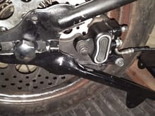 CALIPER POSITION BEFORE ANCHOR MOUNT INSTALLED