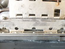 strap removed and latch spread open