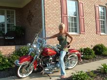My wife sitting on my bike