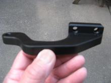 This is one part of the rear TT stabilizer - though not very big, no way I could install without removing muffs first.
