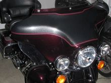 Stock windshield cut down 3 inches.