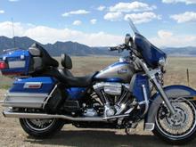 My '09 Ultra near the Wind Technology Center with the Flatirons &amp; snow capped peaks in the background.