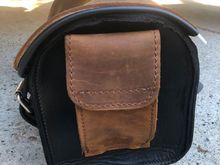 Side view showing one of the end pockets
