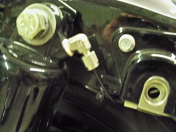 nut and ferrule fittings , stainless , but brass will will just the sane ,shocks are 1/8" NPT ...tubing is 1/8" ployflow ..good for 350# ...but any good to 100 will work ..will never see over 50# !!!