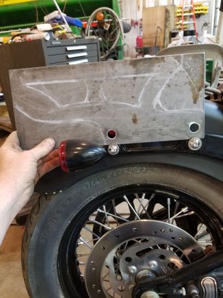 My dad had an old trunk from his CB750 still laying around so I thought I'd make some brackets and see how it looked