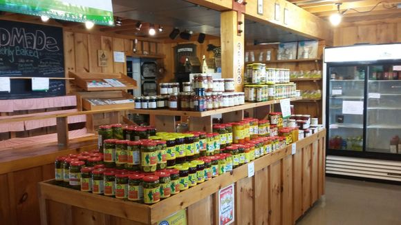 Photo inside the market. Lots of jams, jellies, pickles and sauces.