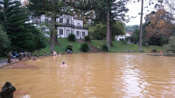This volcanic lake pool is in the middle of the village of Furnas. You can actually swim in this pool and believe it or not we did. Supper warm water.