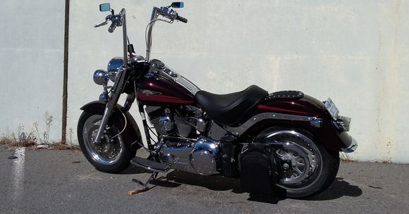 Here is the Fatboy with a Mustang wide seat (17" wide to be exact). VERY comfortable seat.