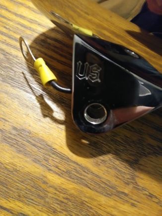 Not sure the brand but has US engraved in the bezel mount. The lamp plug will have to have the wires from your bike soldered or crimped to its wires.  I recomend soldering as it is in my opinion the best way to connect wires. Its simple to do and its a skill that comes in handy for any fabricaction or customizing that ya wanna do to your bike.