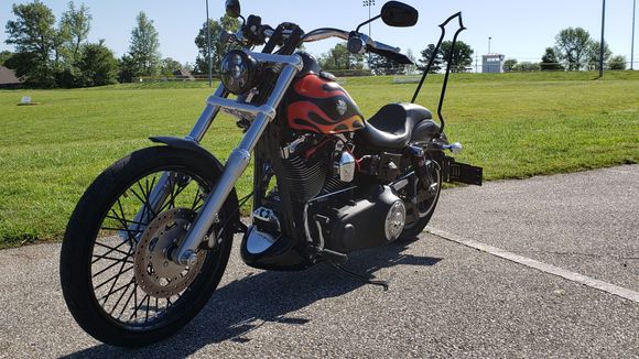 No Bars yet. Im having a problem crossing over to them.  I really like the look I got going now.
I have ordered the black heat shields for the exhaust though.