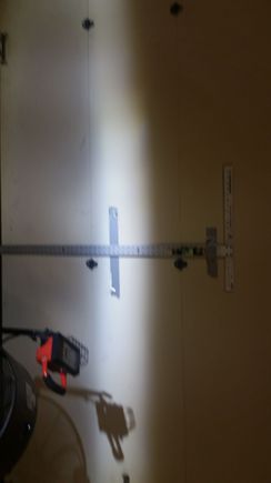 Sunpie low beam. Considering placing a 1/4 inch spacer behind up down adjuster, and maybe a longer screw to lower it a bit more. 