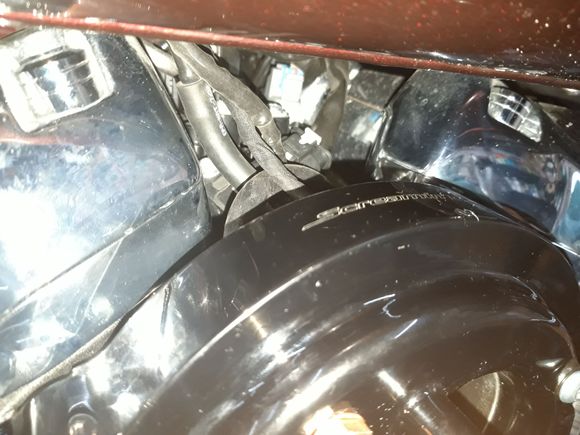 Top breather pipe tucked under wiring