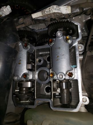 Removing cams to add smaller shims, they all have gotten tight