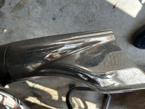 Left side muffler tip.