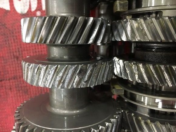 Looks like material got under 2nd and split shafts and spun 3rd. Clutch went soft between shifts the mtl concert in trans. 