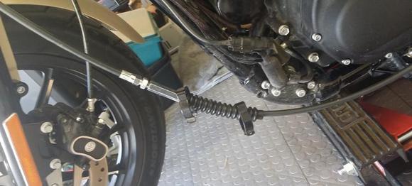 found it best to just take off the clips to slack the adjuster nut. obvious i know...