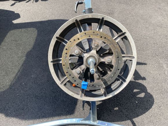 17" HD rim with spoke mount rotors on a Rabaconda manual tire machine.