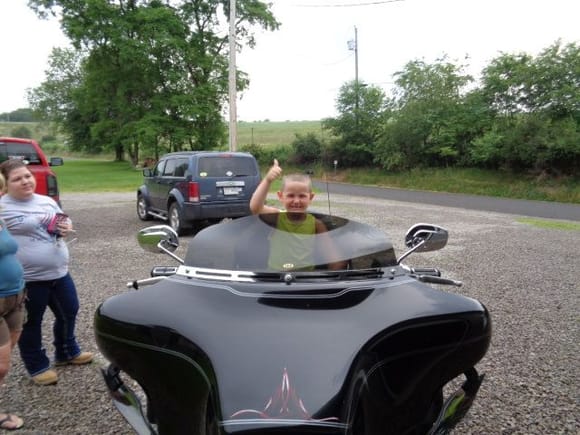here is a picture of my Stealth windscreen with my Grandson checking out his Harley when I Can no longer ride in 20 or so years.
