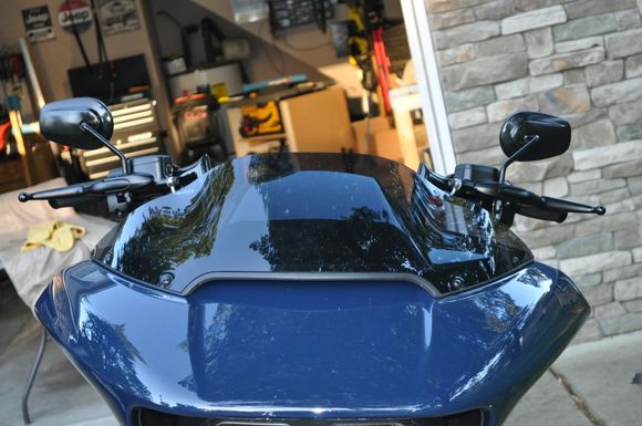 Should still get really good wind protection. At 5'9" the bars are shoulder height. 