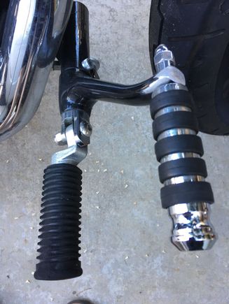 Stock foot pegs but brought closer to foot peg and extended out brake pedal