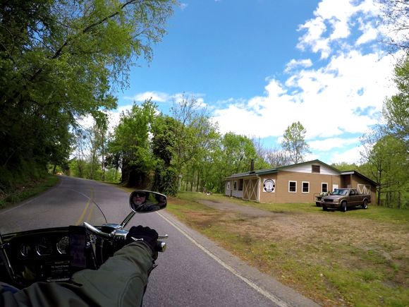 Interesting sign. Looks to possibly be a MC club house?