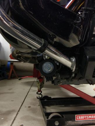 The lights are mounted on the floorboards.