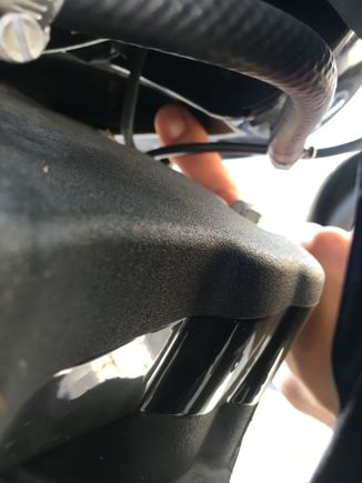 This was taken from the right side of the bike, looking into the lip on the bottom of the tank on the left side.