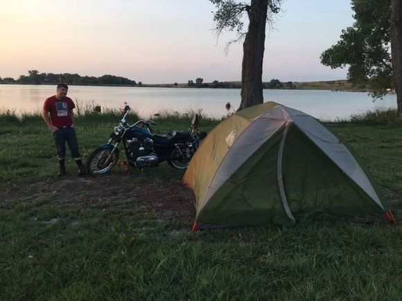 This was our camping spot in Kansas and when I reflected back on the beginning of the trip. It rained pretty good that night but as you see in this picture, our tent and Harley survived.