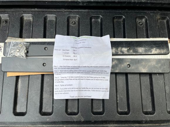 Never used Saddlebag skids with stainless mounting hardware