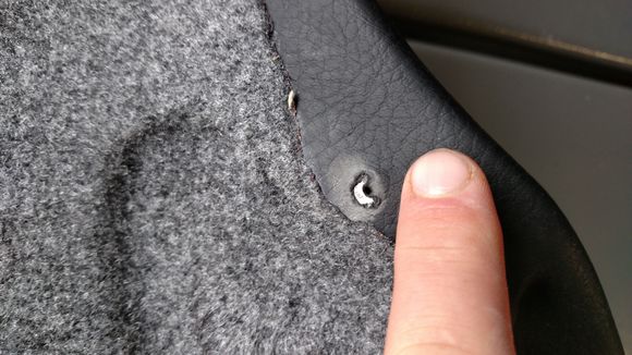 Metal sticking out of seat.
