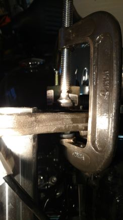 Used a C clamp to squeeze the bushing together. They are very hard to push in with the sleeve in.