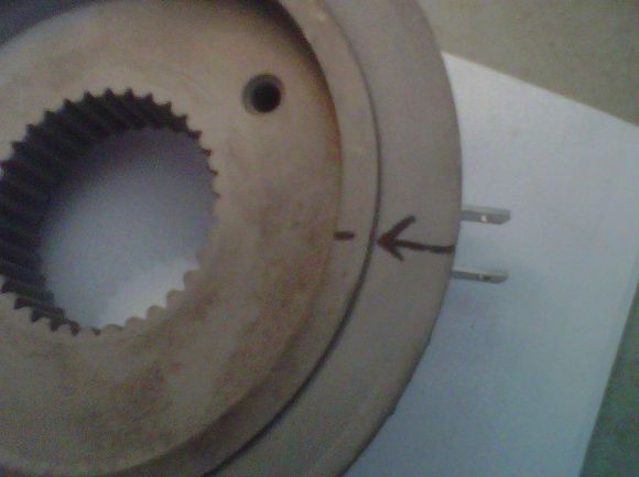 Arrow point to the retaining flange.