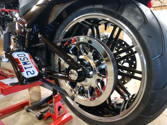 I got mine on today Dude. Wrestling that big tire sucked. I hope ya get yours figured out. They look nice. Yours looks just like mine. My bike is an 18 softie, but the cover is listed for 17 to older somfin. If that cover doesn't lay flat against the pulley, well, then, IT DONT FIT. EVEN IF YA TRIED TO SPACE IT OUT LIKE IN YOUR PICS, ITS SURE TO INTERFERE WITH YOUR LOWER BELT GUARD and look like shit from the rear. What year FLD ya got again? Is a FLD a Switchback?