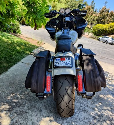 

Gotta buzz off the exhaust hangers on the bag rails 
