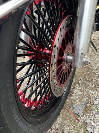 DNA Mammoth 52 fat spokes (18” Front/16” Rear). With matching rotors and pulley.
Powder coat: Black/Candy Red