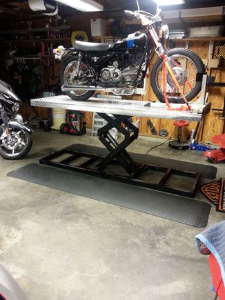 My 1973 SS350 sitting on my handmade motorcycle lift. My 2015 CVO sitting in the background.