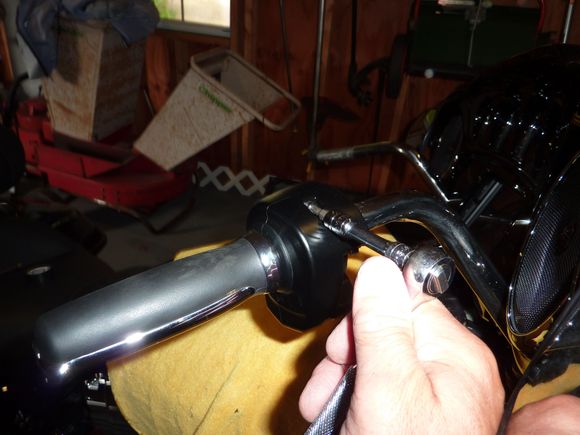 Take the two screws out of the throttle side switch housing.and pull the back off.